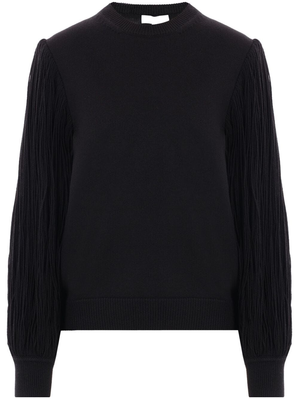 Shop Alaïa Fringed-sleeve Knitted Jumper In Black